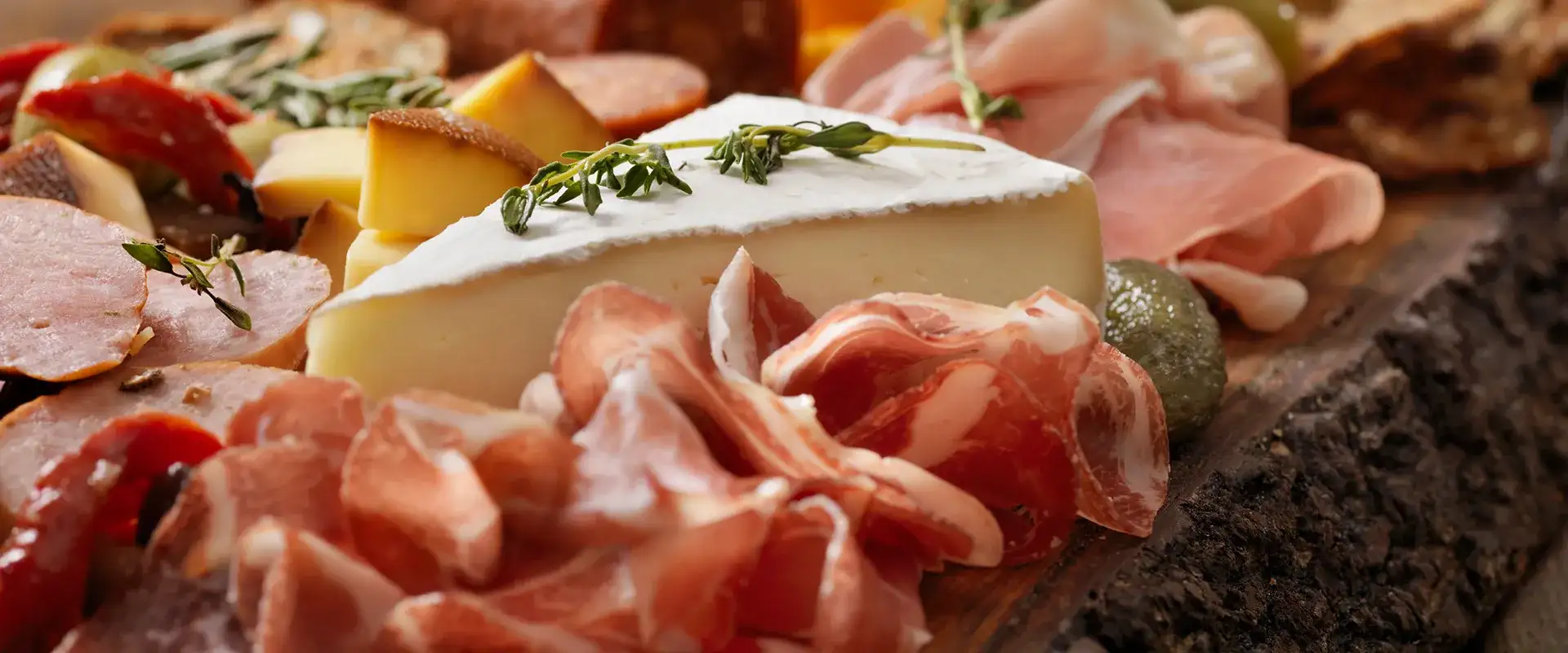 Charcuterie board with assorted meats and cheeses.