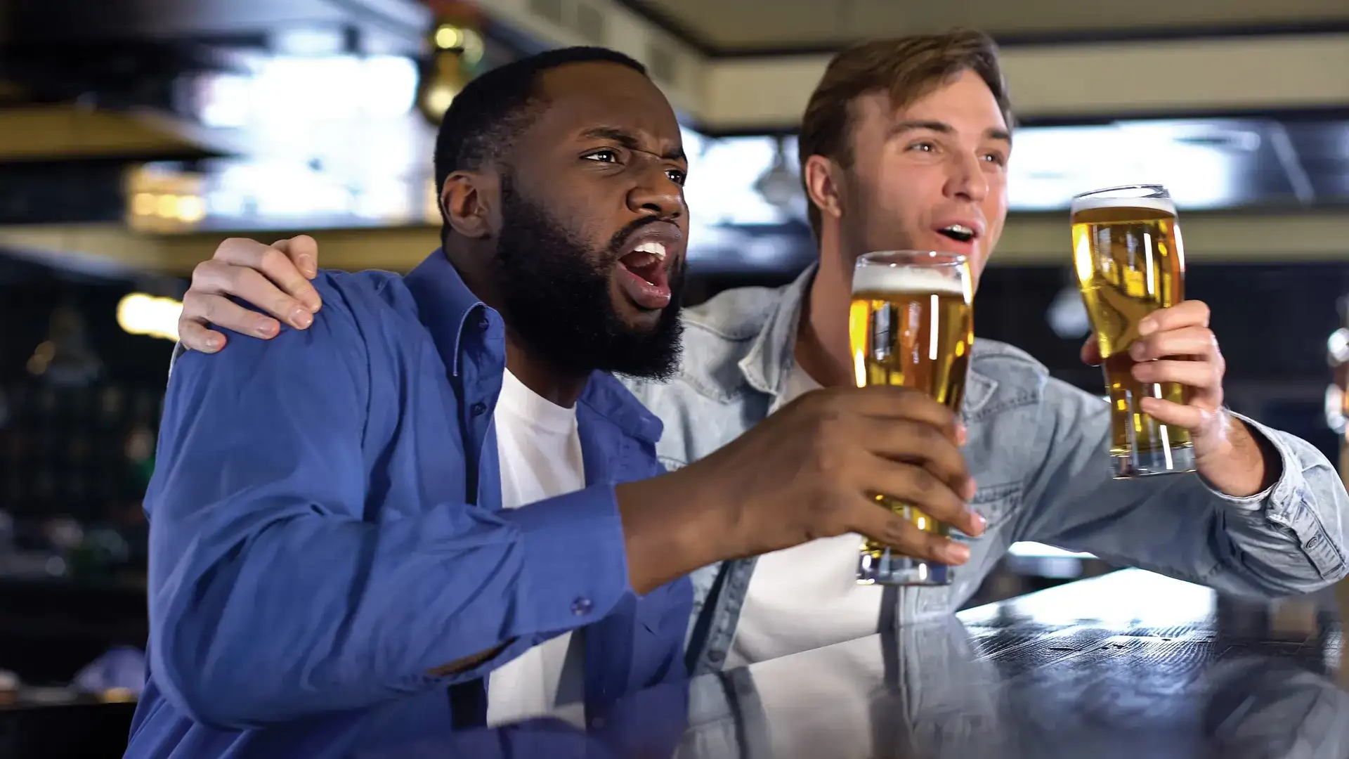 Men Cheering and drinking beer.