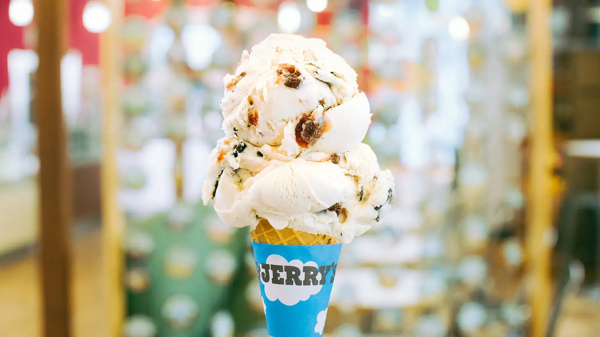 Ice cream cone with two scoops.