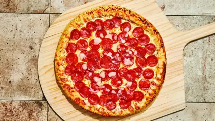 Pepperoni and Cheese Pizza on a Pizza Peel