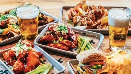 Burgers, wings, nachos, sandwiches, and pints of beer from Manning's.