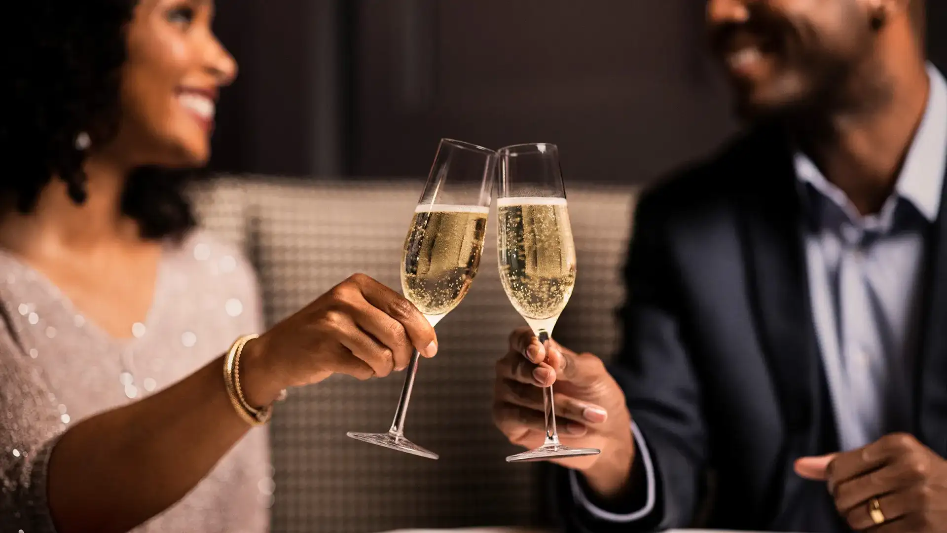 Couple toasting with champagne.