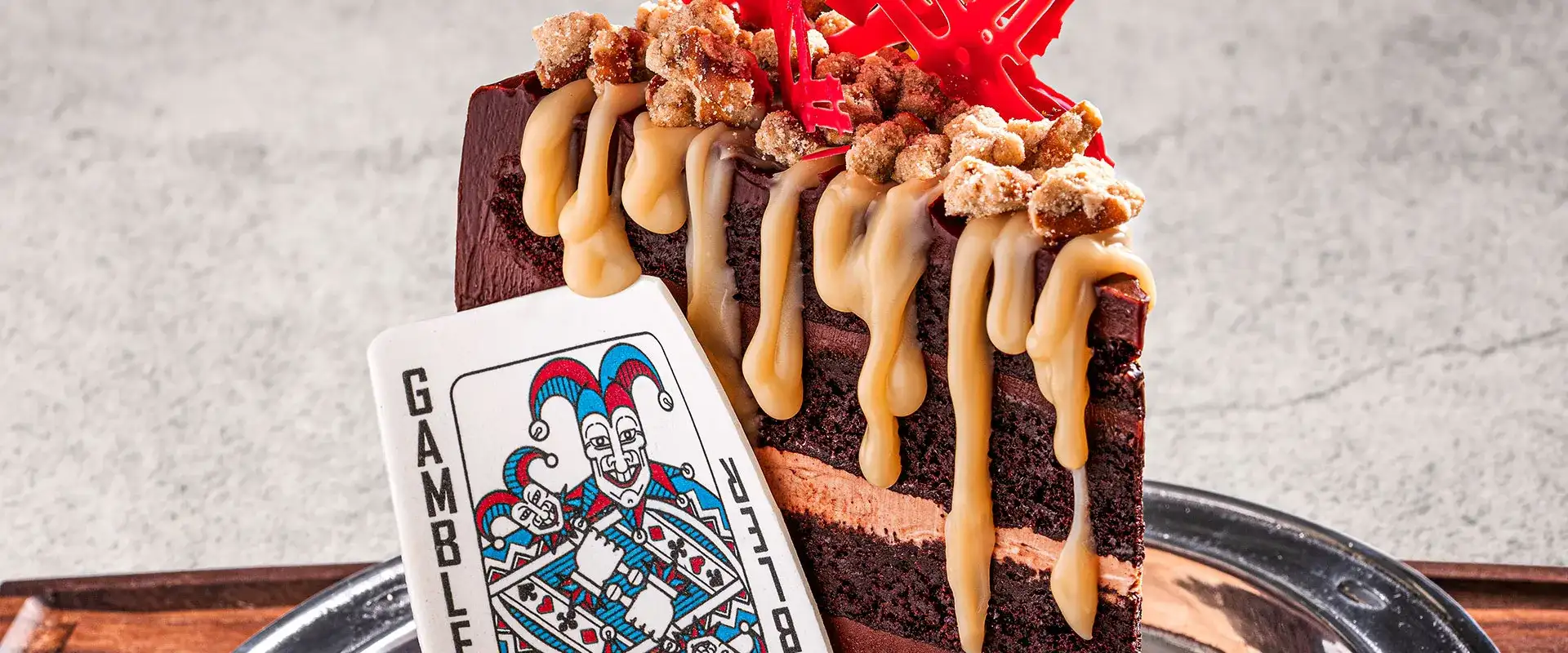 Binion's cake presented with a gambler card