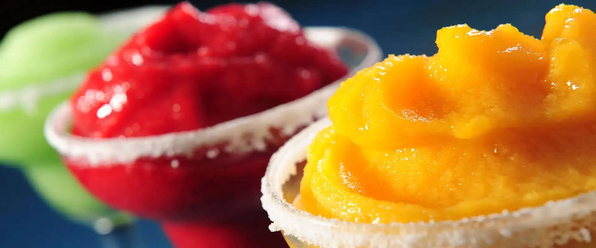 Fruity slushy drinks with salted rim.
