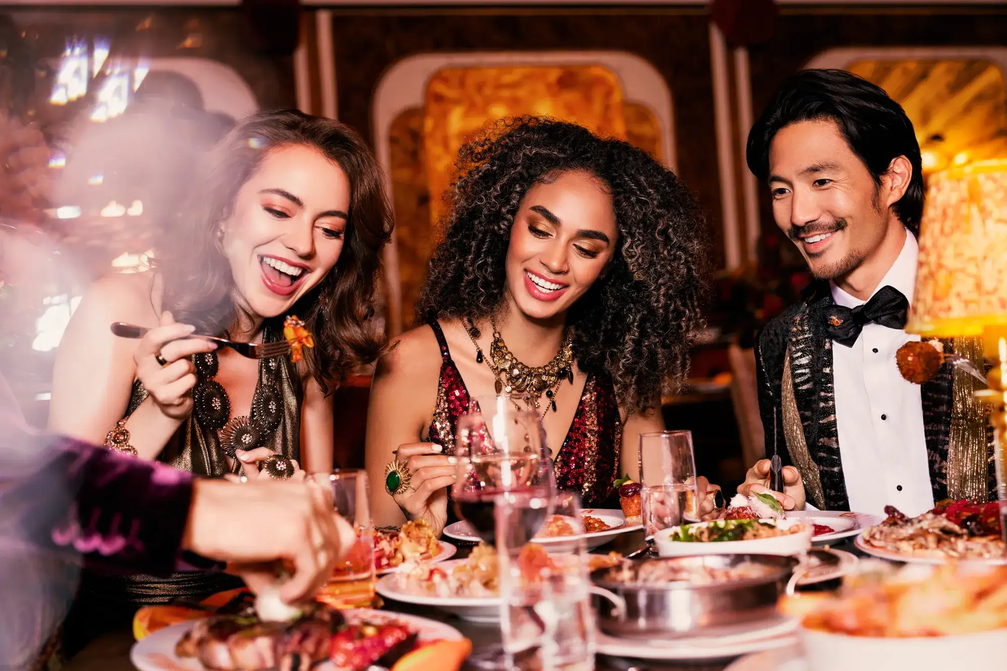 A group of friends eating at Caramella's Italian Restaurant at Planet Hollywood Las Vegas