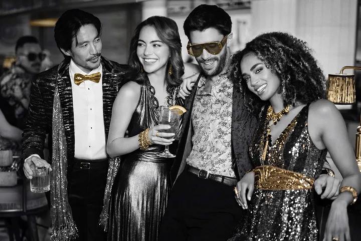 Guests celebrating at an exclusive event, representing members-only event access for Olympus Caesars Rewards members