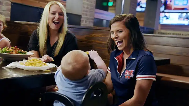 Adults & a Baby in a Family Friendly Atmosphere