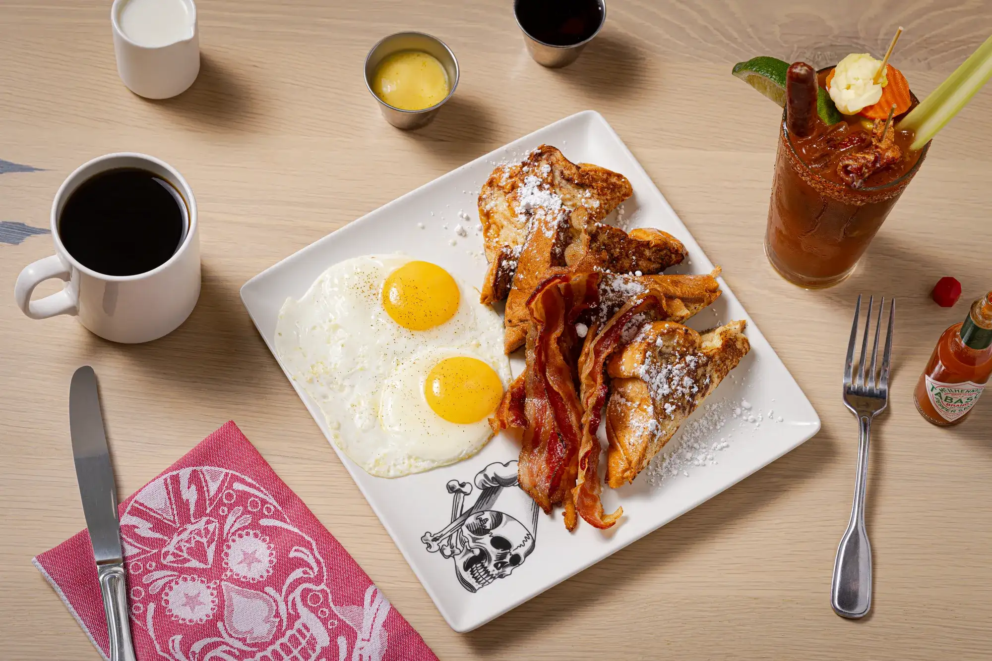 Guy Fieri's Ktichen + Bar at Harrah's Council Bluffs.  French toast, bacon, eggs, bloody mary, coffee.