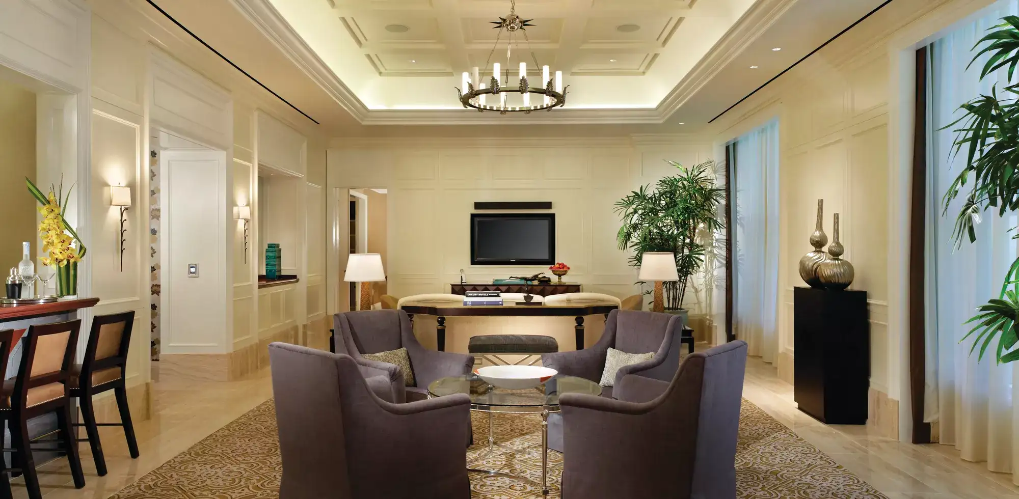 Octavius Executive Suite at Caesars Palace Las Vegas featuring a 1,044-square-foot  living area with lounge seating, bar, and dining space for business traveler  client meetings and corporate entertaining