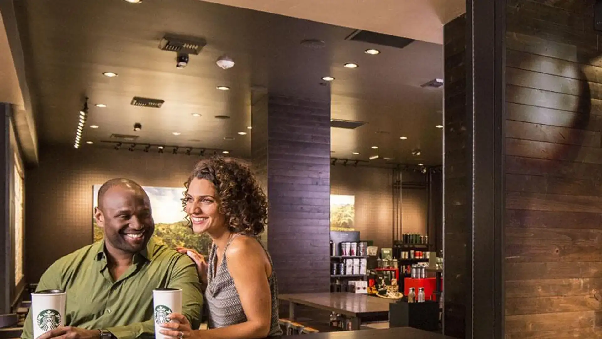 Couple having coffee at Starbucks Eldorado.