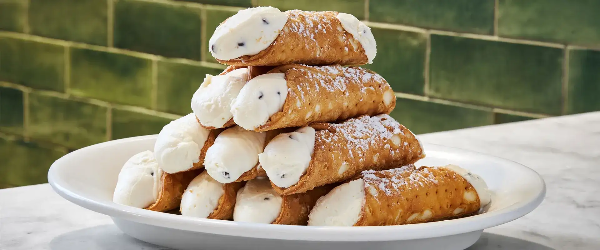 A plate of cannoli lobster tails