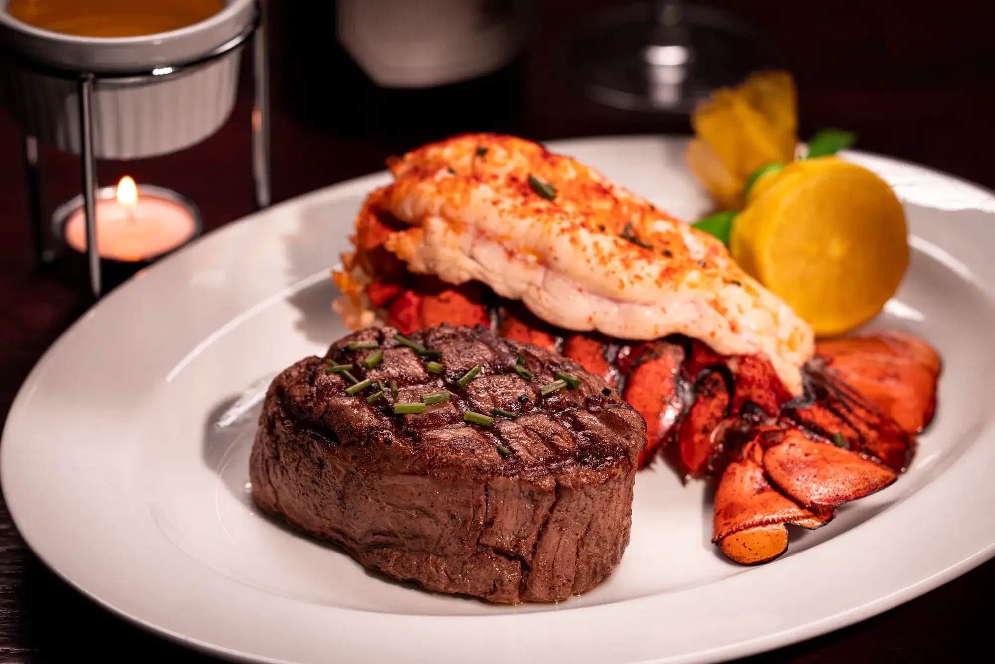 Steak and lobster tail plated