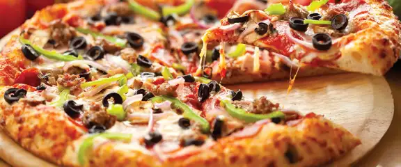 Pizza with pepperoni, olives, and green peppers