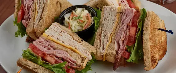Club sandwich and coleslaw at Myron's.