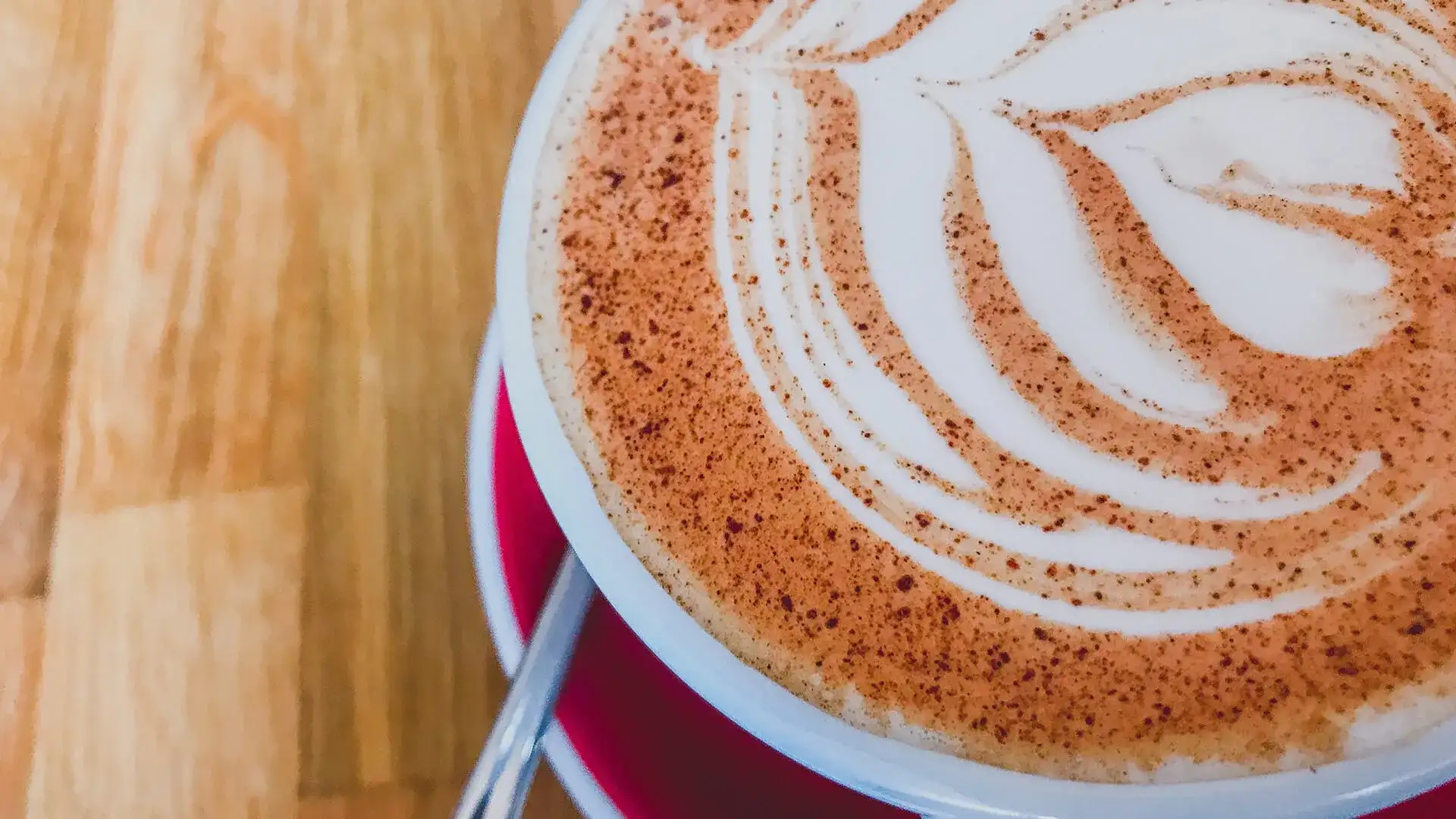 latte foam art in a cup of cappuccino