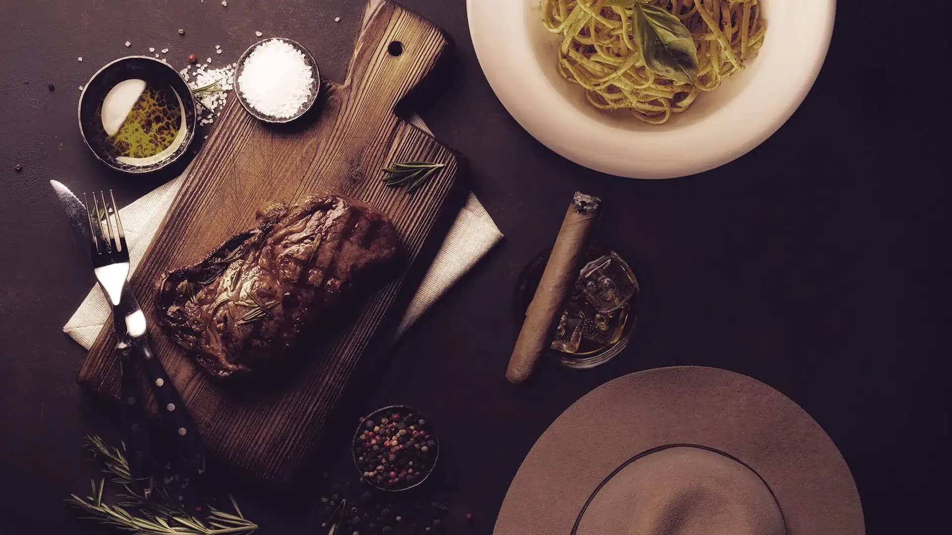 Fedora, cigar and steak at Bugsy and Meyer's Steakhouse located in Flamingo Las Vegas