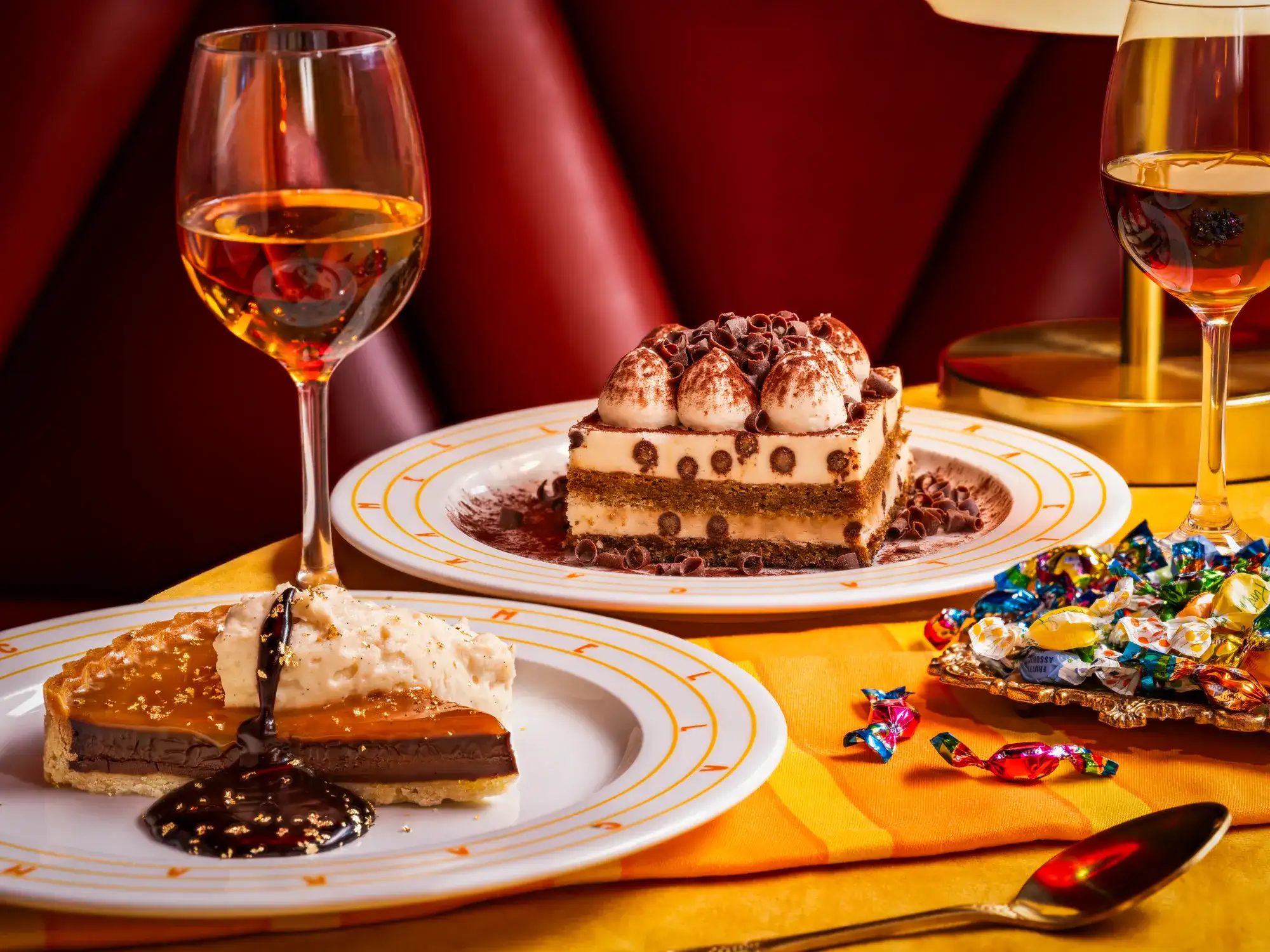 Tiramisu and a salted caramel chocolate tart served with dessert wine at Caramella's Italian Restaurant on the Las Vegas Strip at Planet Hollywood.