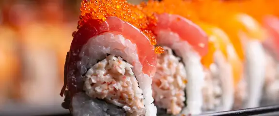 Fresh sushi with Salmon and crab center.