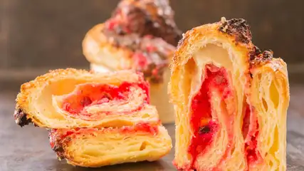 Brioche pastry cross-section with fruity filling.
