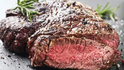 Medium cooked steak with rosemary