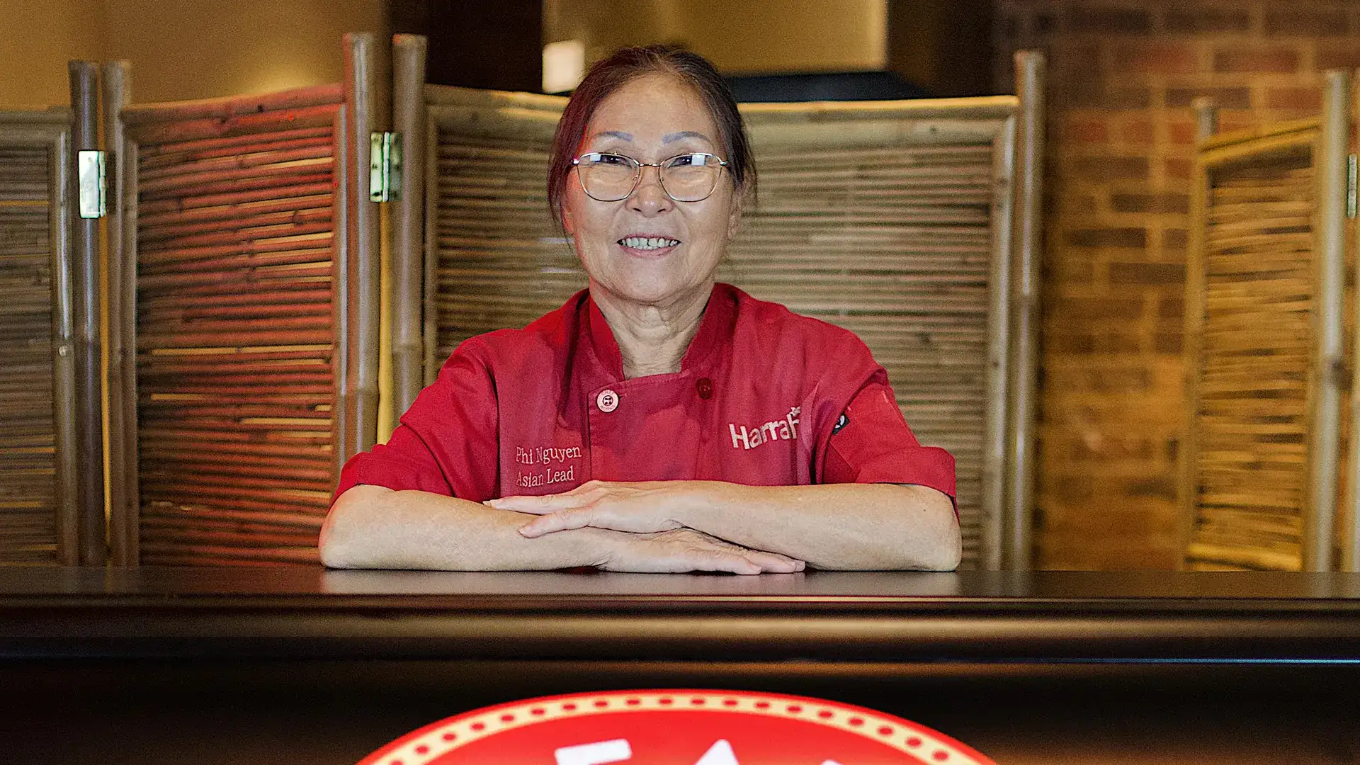 Mrs. Phi behind the 2Geaux Pho counter.