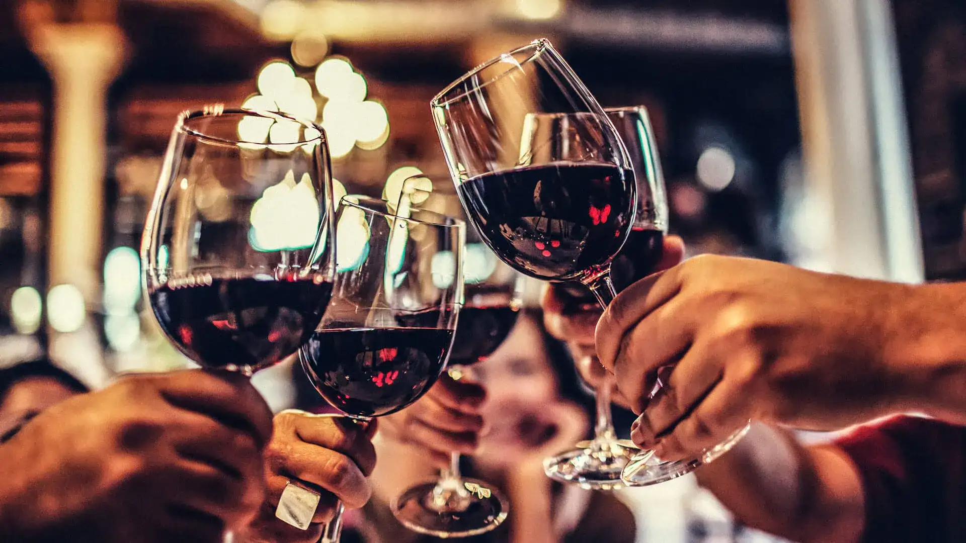 Cheers of wine glasses.