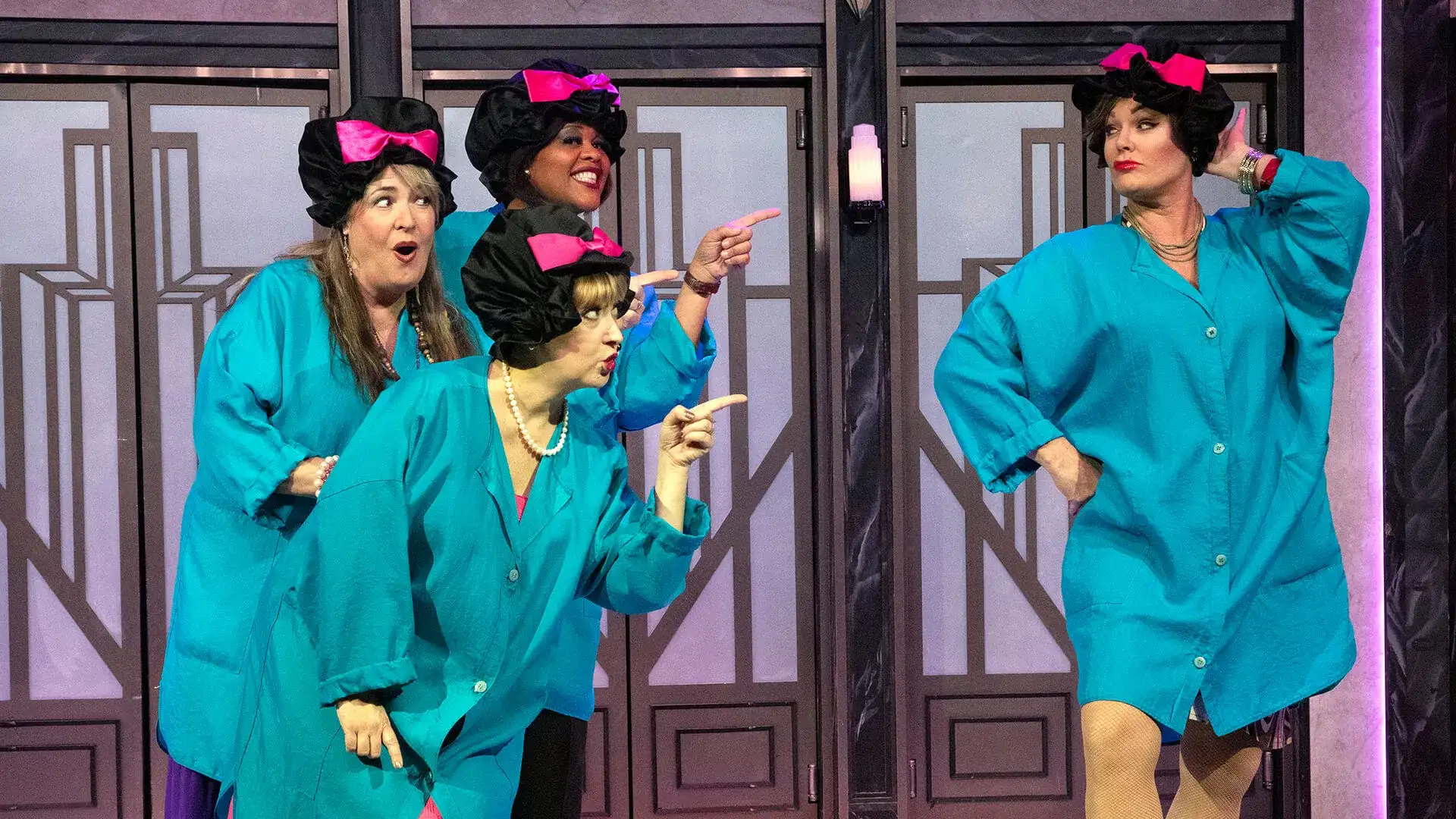 cast of Menopause the Musical in smocks and hair bonnets