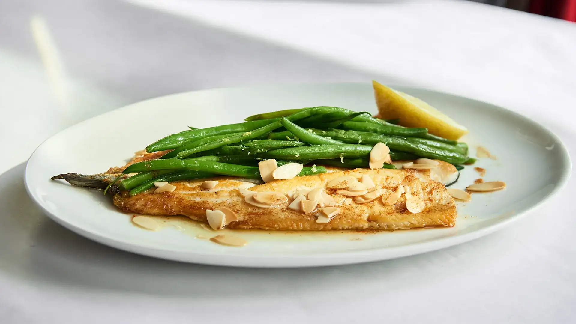 Fish and Asparagus plated on a dish