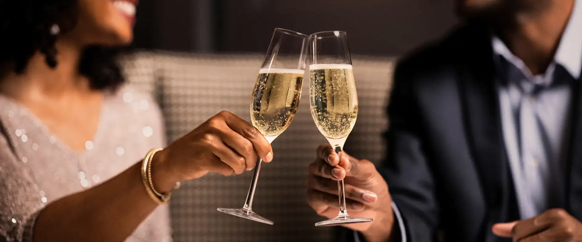 Couple toasting with champagne.