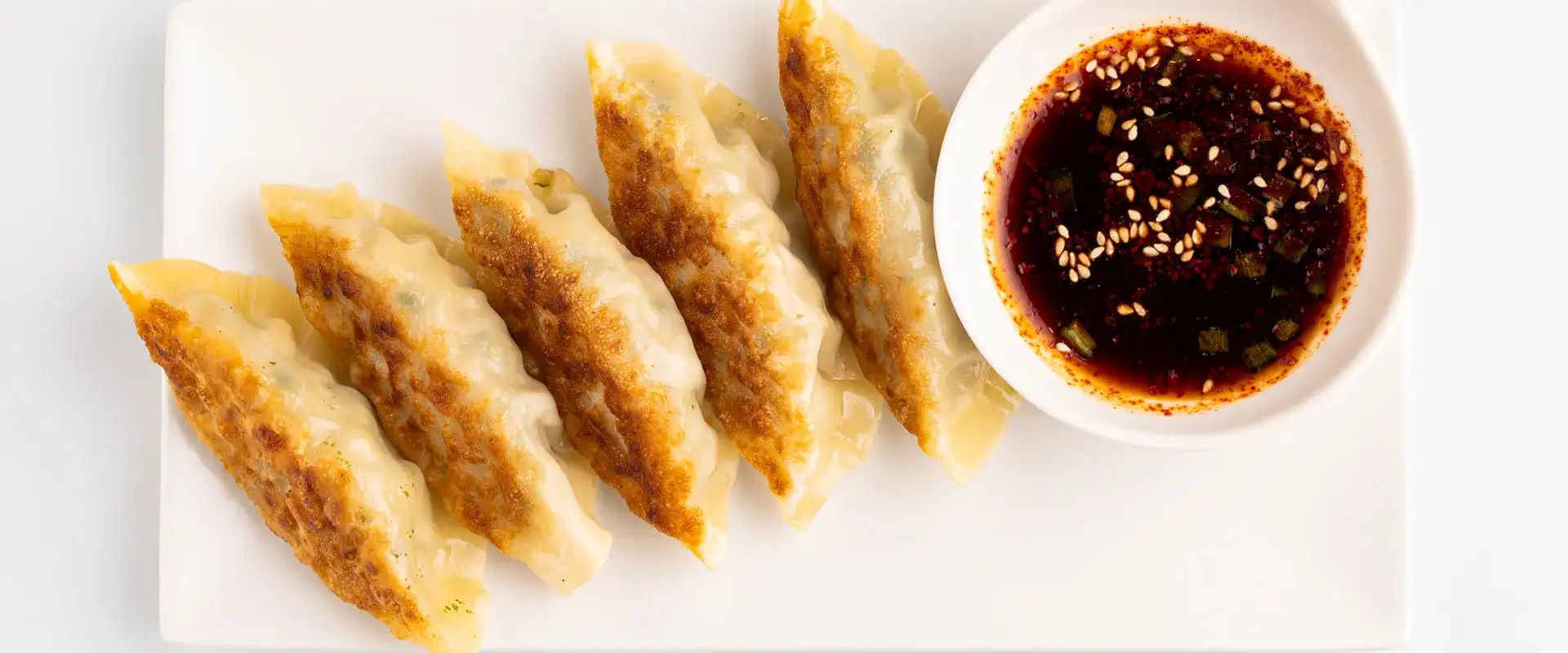 Pan Fried Dumplings at Mokbar by Esther Choi Restaurant located in the Celebrity Food Hall at Caesars Palace Las Vegas.