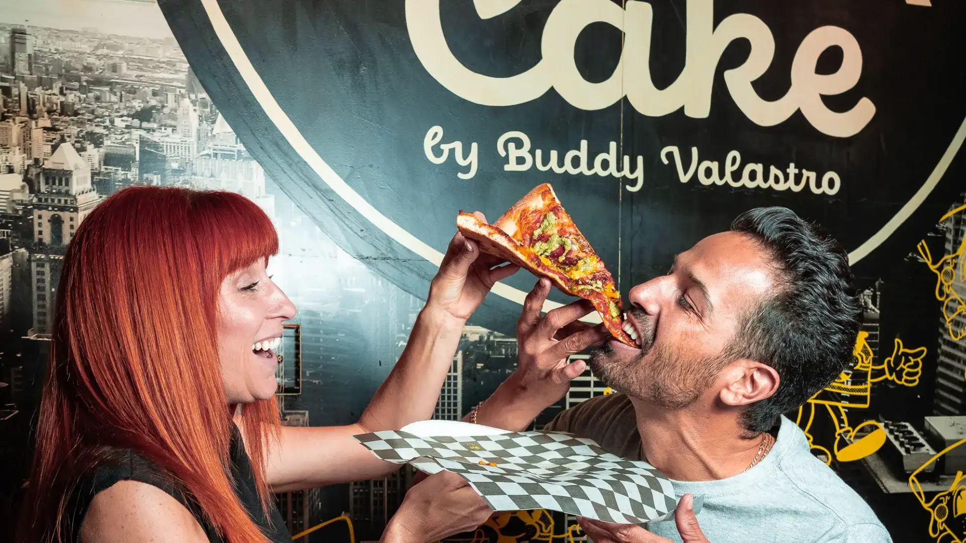 Couple eating pizza at Pizza Cake by Buddy V. at Harrah's Las Vegas