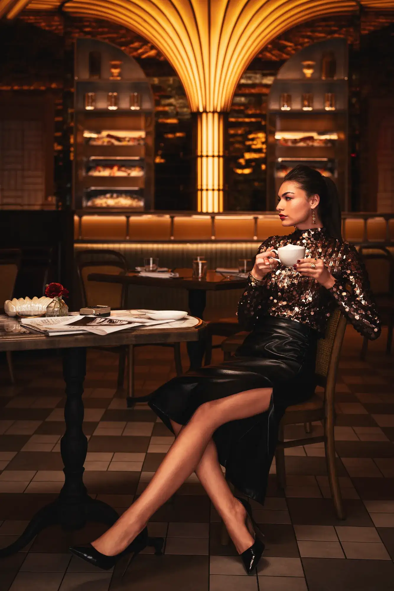 Person seated alone with a cup at Brasserie B in Caesars Palace in Las Vegas.